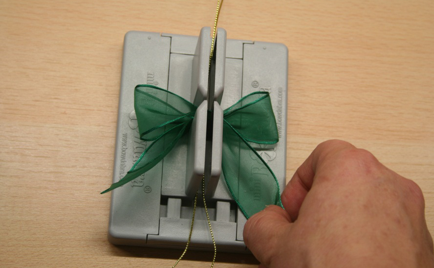 Rudolph the Red Nose Reindeer's Wife Treat Bags how to make a reindeer bow