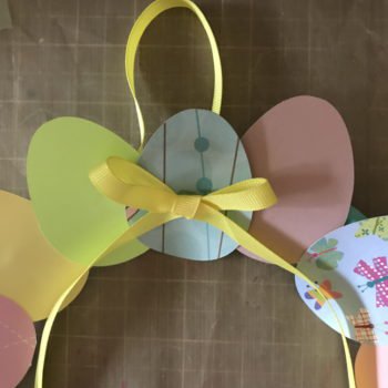 Glue Ribbon Bow in Place on Front of Wreath