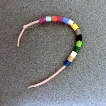 Thread 12 to 14 Perler Beads on Hair Tie