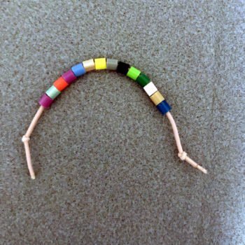 Tie a Knot at Opposite End of Hair Tie